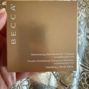BECCA Shimmering Skin Perfector Pressed - Champagne Pop Highlighter